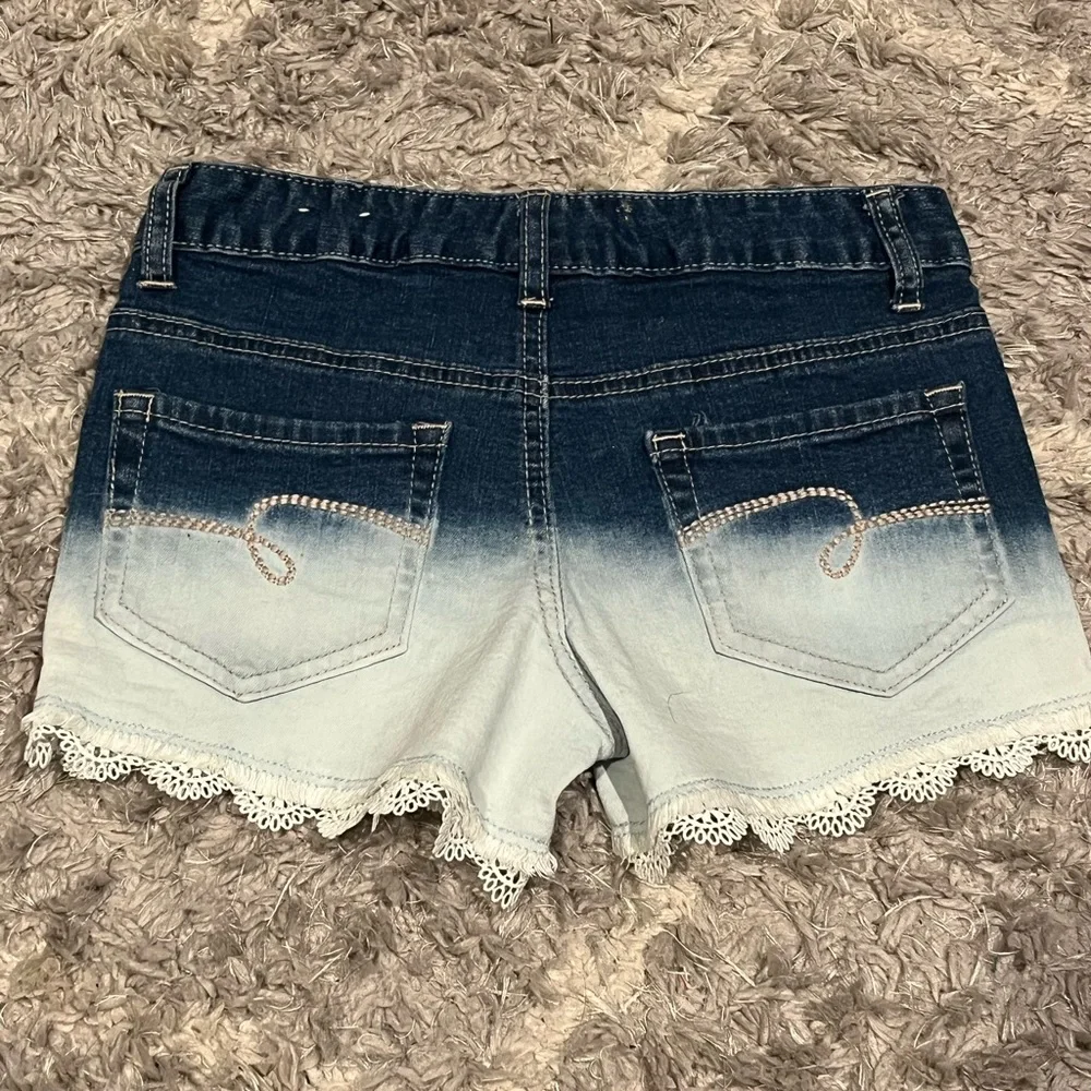JUSTICE Girls Denim Shorts-  Size 10 These are cute and fashionable.